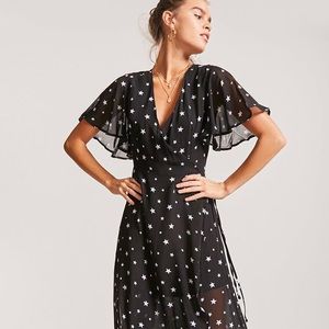 Black and white star pattern wrap dress